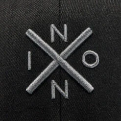 NIXON Exchange Flex Fit Hat -Marine Sports Gear 44572 202320Nixon20Exchange20Flex20Fit20Hat20C28752020 20Black2020Charcoal20Close20Up.2000x2000